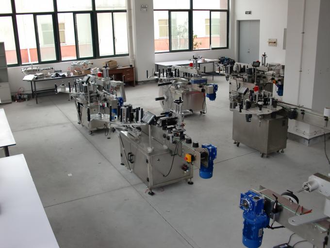 Hög hastighet dubbel sida klistermärke maskin hydraulolja