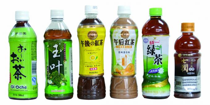 Två sidor flaska automatisk krymphylsa etikettapplikator för mineralvatten