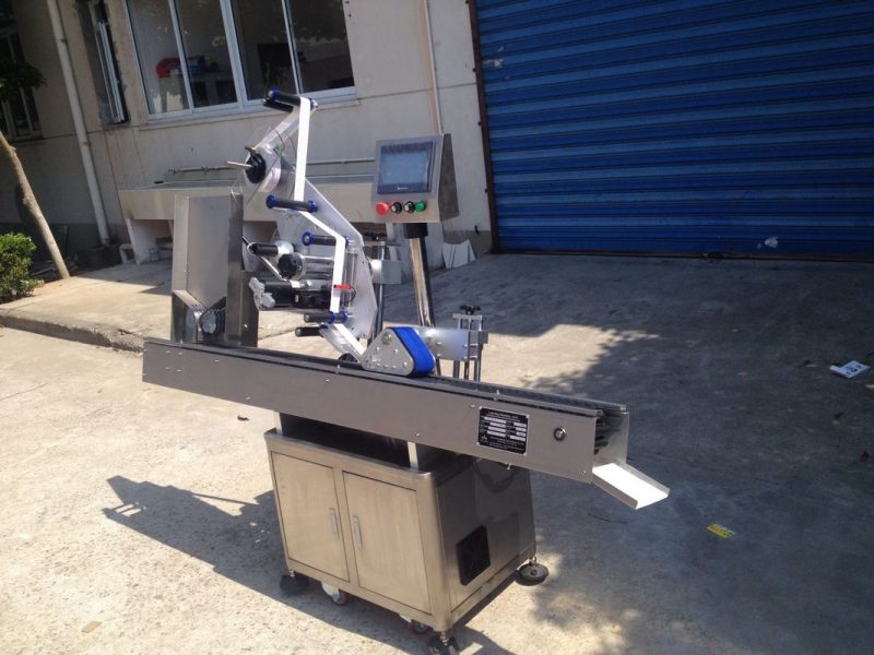 Kina 12-25mm Diameter rund flaska självhäftande klistermärke automatisk märkningsmaskin för läppstift kosmetika leverantör