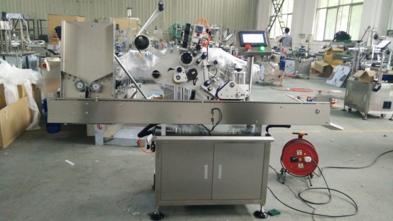 Kina hög hastighet små runda burkar etikett lim maskin, ögon svart flaska etikett klistermärke maskin för kosmetika leverantör